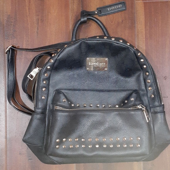 bebe Handbags - Bebe Studded Convertible Purse/MiniBackPack